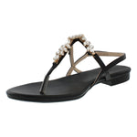 Beautiful black women's thong style sandal with a flat heel, sling back with buckle, and clear gemstones held with gold casing.
